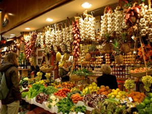 Strings of garlic and fresh produce abound in the Enoteca Lombardi.
