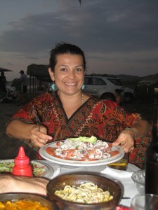 Our Ecuadorian friend, Maria Olga, with one of the many delicious seafood dishes we ate at the beach.